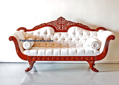 Carved teak sofa